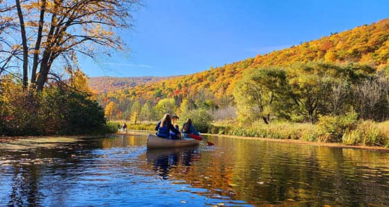 FLCC students canoeing in Honeyoye Lake on a beautiful Fall day.